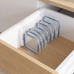 LidLoft 10-Slot mounted on a drawer wall holding food-storage lids upright